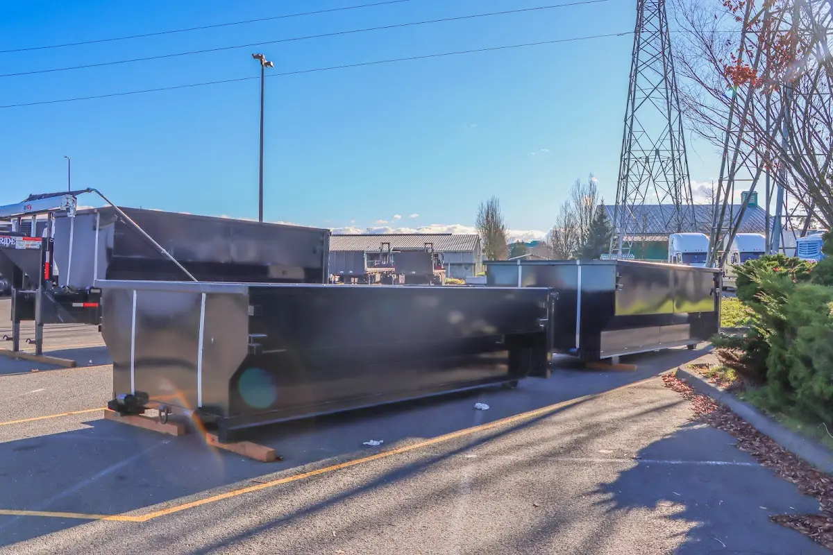 Roll-off dumpster ready for waste disposal at job site for Concrete Dumpster Rental in Neshannock